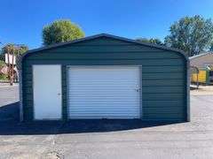 20x21 ft. Green metal Garage - w/ man door & garage door