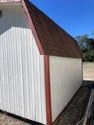 10x14 White and red storage barn - contents not included