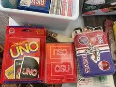 Lot of games & movies including card shuffler, playing cards, LCR & others