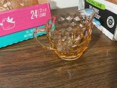 Pink depression glass mugs and sugar/cream containers