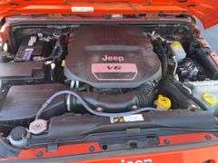 2015 Orange 4D Jeep Wrangler