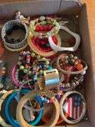 Flat of costume jewelry - mostly bracelets