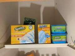 Large assortment of cleaning supplies - Swiffer dusters, spray, and more