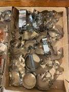 (2) flats of antique cookie cutters and icing dispensers