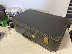 Suitcase, camera with bag, antique General Electric speaker, tin, and more