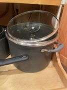 Kitchen drawer w/ mostly pots & lids