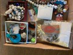 Flat of costume jewelry - mostly necklaces