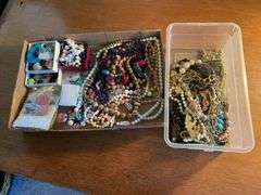 Flat of costume jewelry - mostly necklaces