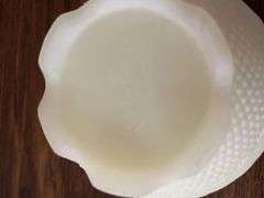 (4) pieces of Fenton - including owl dish, pitcher, bowl, and hand painted candle