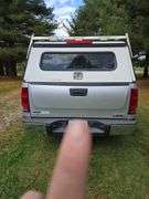 2012 GMC Sierra 1500 4x4 w/ toolbox cap. Runs good. Has a weak battery.