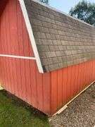 Red and white 8x12 storage barn - contents not included