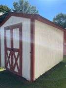 8x12 White and red storage barn - contents not included