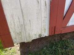 8x12 White and red storage barn - contents not included