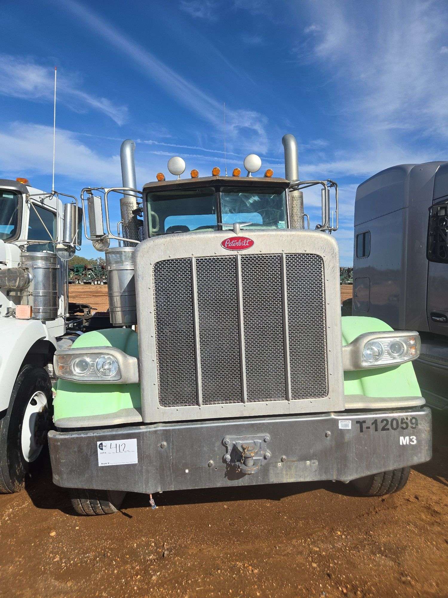 2012 Peterbilt 388 showing 48,817 mi, 9,224 hrs - runs