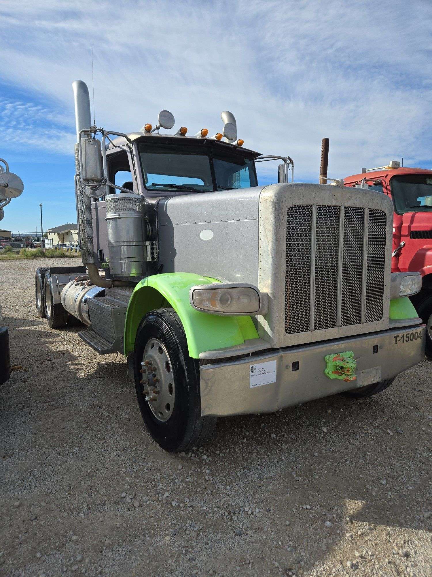 2015 Peterbilt 389 showing 53,258 mi, 8,978 hrs- runs