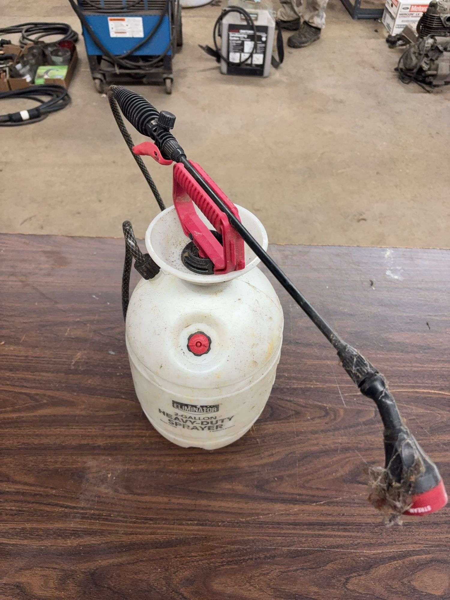 Eliminator 2-gallon sprayer - Kaufman Realty & Auctions