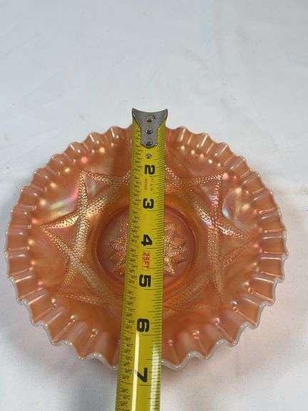 Dugan Ski Star peach opalescent carnival glass bowl.