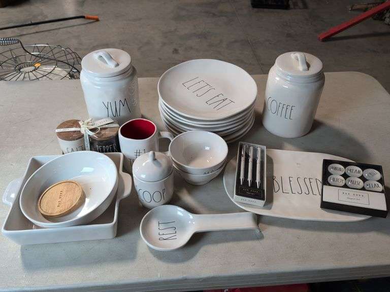 Assortment of decorative plates, jars, and more