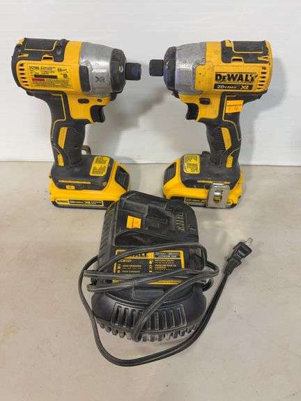 (2) DeWalt cordless impact drivers w/ battery charger - works