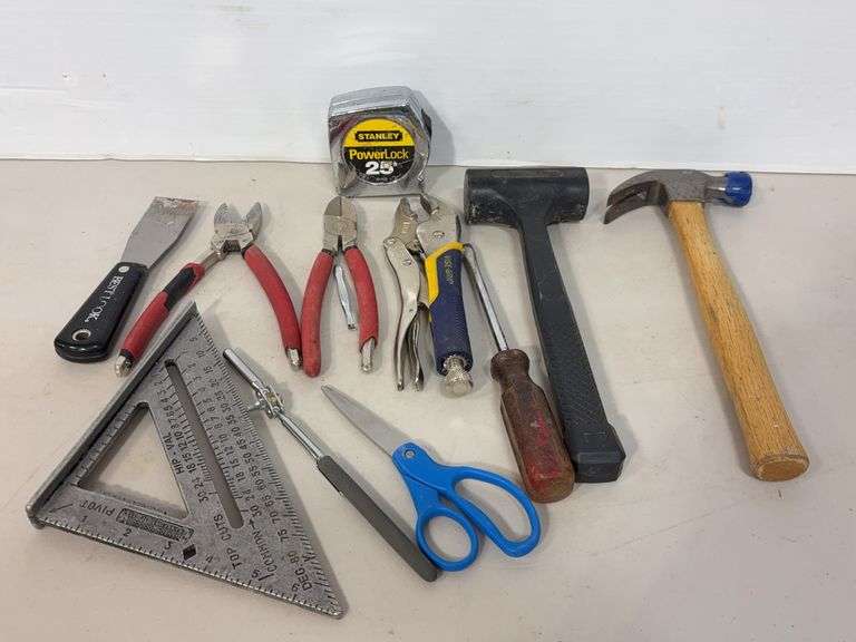 Flat of tools including hammer, mallet, tape measure and more