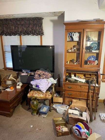Large lot including secretary desk, antique chair, TV, chest, TV stand & more