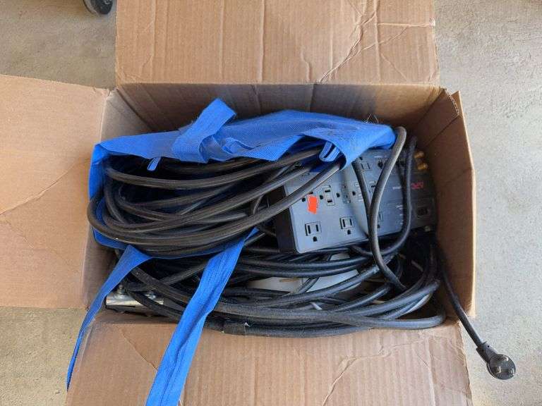 Box of Extension Chords and Surge Protector and Co-Axial Cable