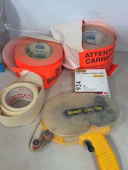 Lot of shop supplies including scotch tape dispenser, fire extinguisher, paint suits and more
