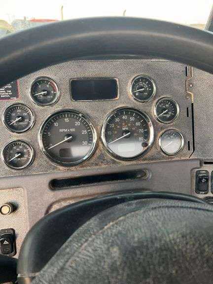 2015 Peterbilt 389 showing 53,258 mi, 8,978 hrs- runs