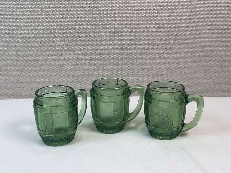 SET OF GREEN GLASS BARREL STYLE SHOT GLASSES
