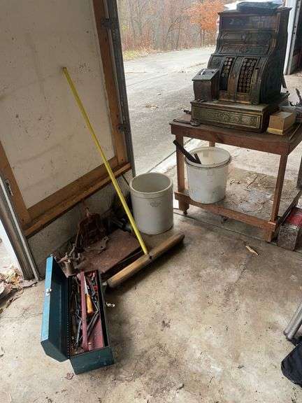 Antique National cash register, wooden stand,  majorly cracked crock, sad irons, toolbox w/ misc. to