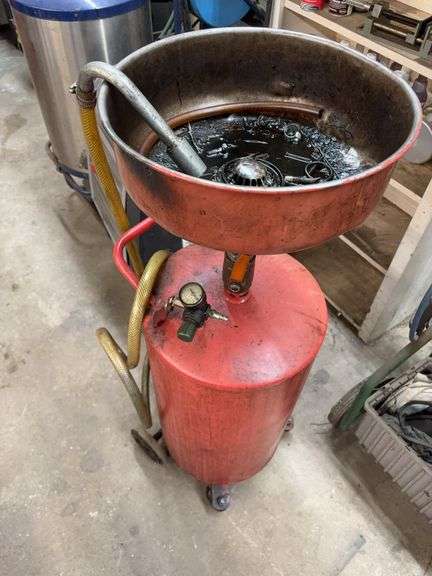 Portable oil drain dolly