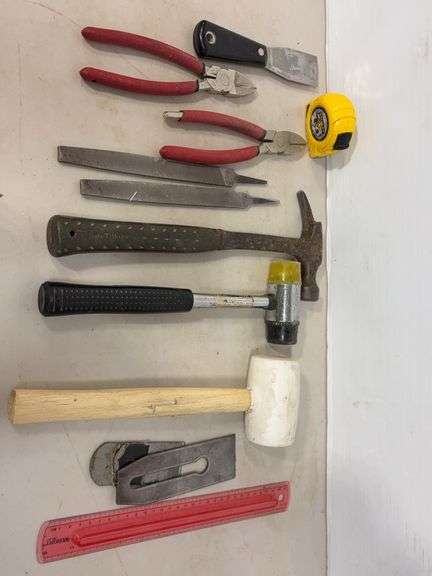 Flat of tools including mallets, wire cutters, tape measure & more