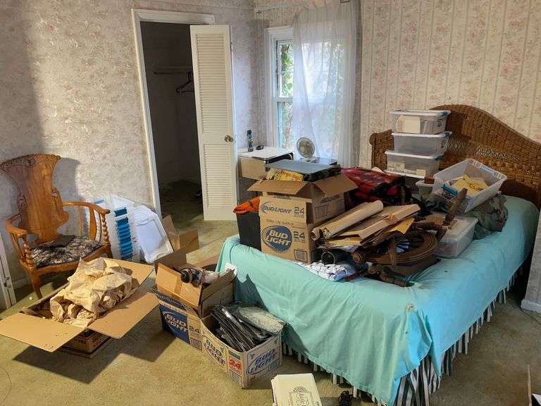 Bed, contents of bed, totes, chair, boxes of items, and more