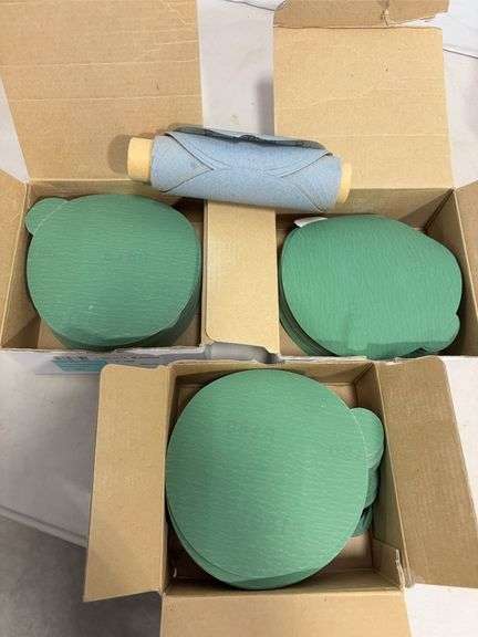 Flat of palm sander discs of various grits