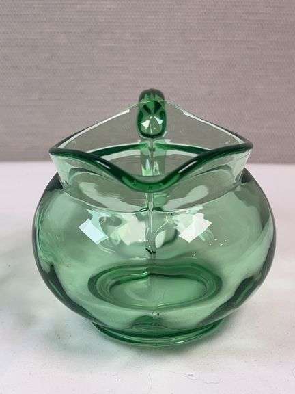 PAIR OF GREEN GLASS HEISEY CREAM AND SUGARS. NO LIDS