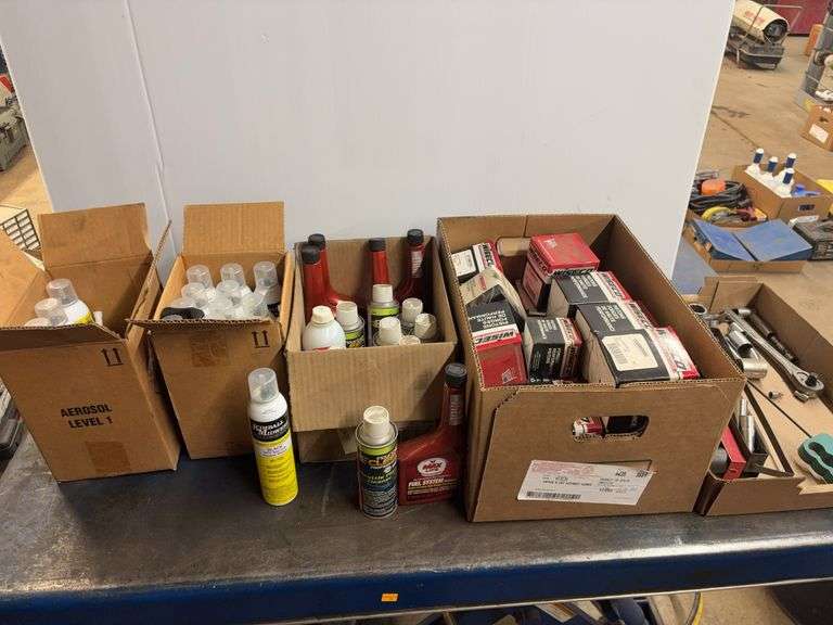 Contents of shelf including sockets, silicone gasket maker, fuel system cleaner & Wiseco pistons