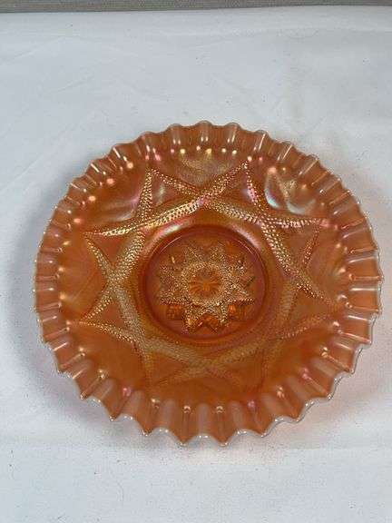 Dugan Ski Star peach opalescent carnival glass bowl.