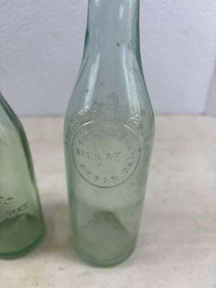 2 Jeffries Millersburg glass bottles and Akron brewing co. bottle