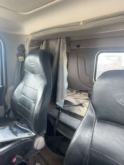 2013 Peterbilt 367 showing 63,847 mi, 9,758 hrs -