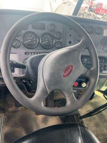 2013 Peterbilt 367 showing 63,847 mi, 9,758 hrs -
