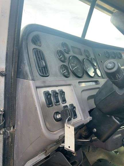 2013 Peterbilt 367 showing 63,847 mi, 9,758 hrs -