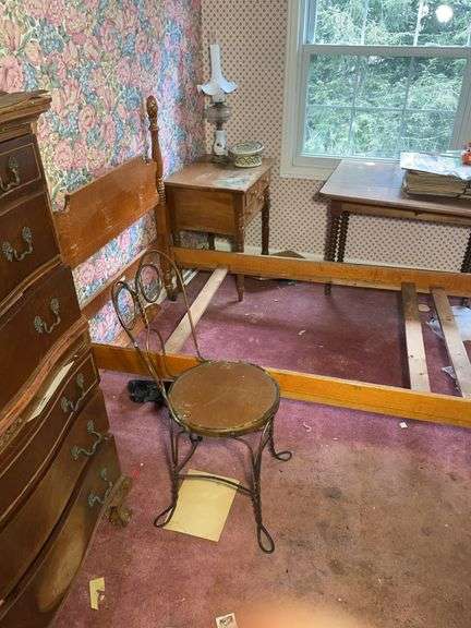 Bed frame, large assortment of vintage books, chest of drawers, chairs, and much more
