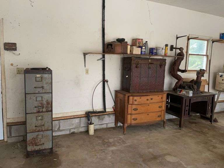 Filing cabinet, chest of drawers, statue, and more
