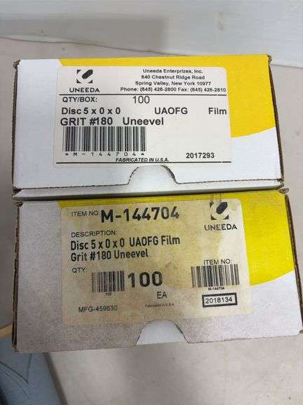 Flat of palm sander discs of various grits