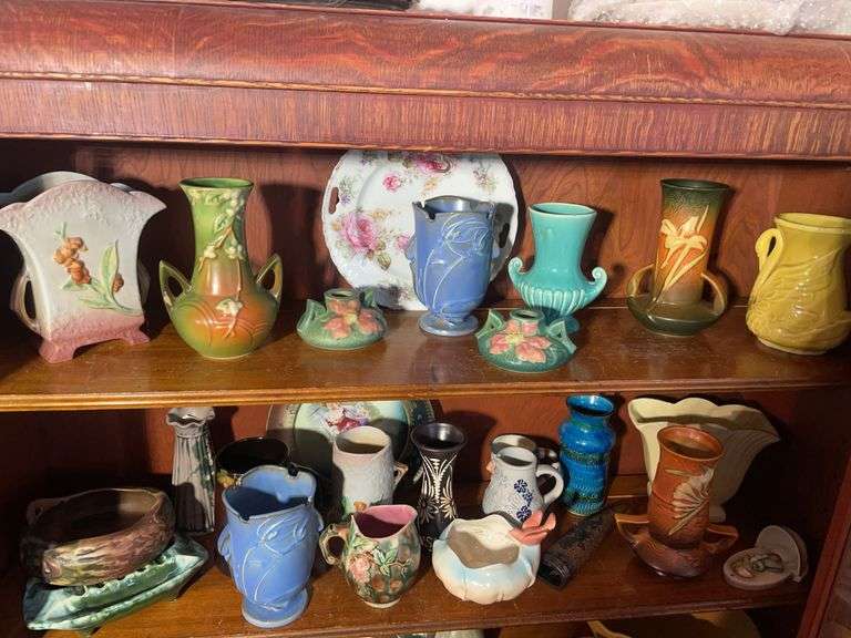 (2) shelves of glassware including Roseville, McCoy & others