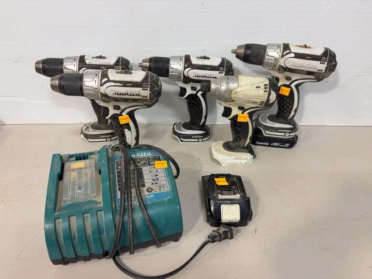 (5) Makita drills & battery charger - works