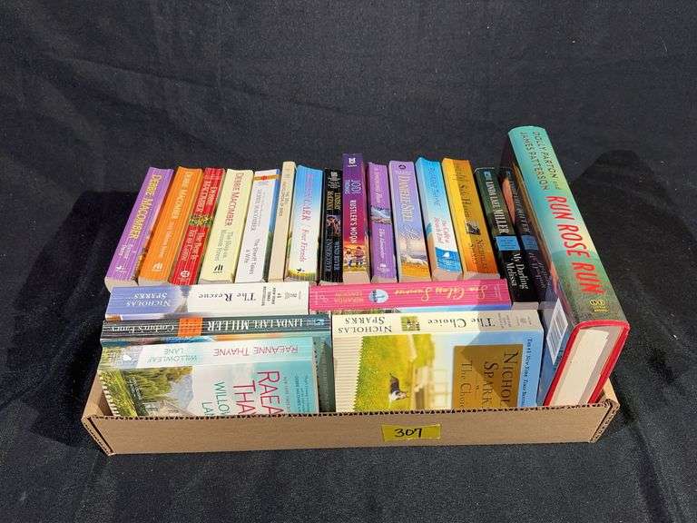 ASSORTED PAPER BACK BOOKS - Kaufman Realty & Auctions