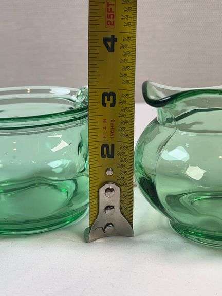 PAIR OF GREEN GLASS HEISEY CREAM AND SUGARS. NO LIDS
