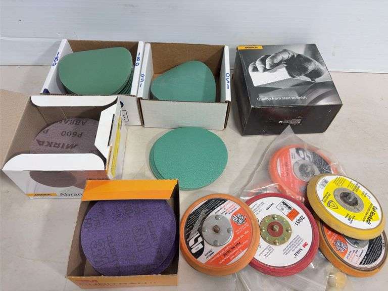 Flat of palm sander discs of various grits