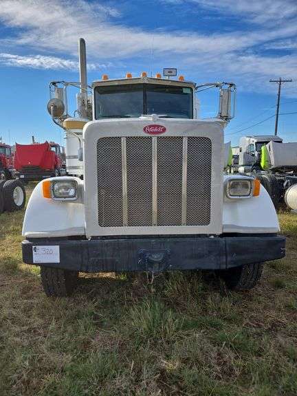 2013 Peterbilt 367 showing 63,847 mi, 9,758 hrs -
